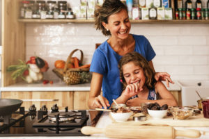 Mother and Daughter cooking with chocolate