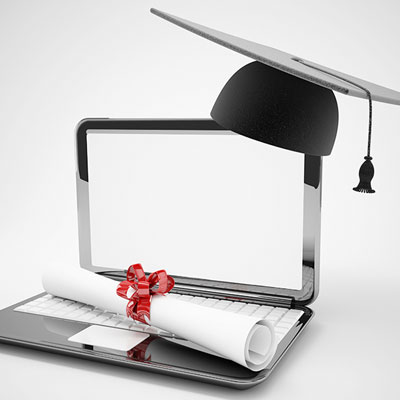 computer and graduation cap